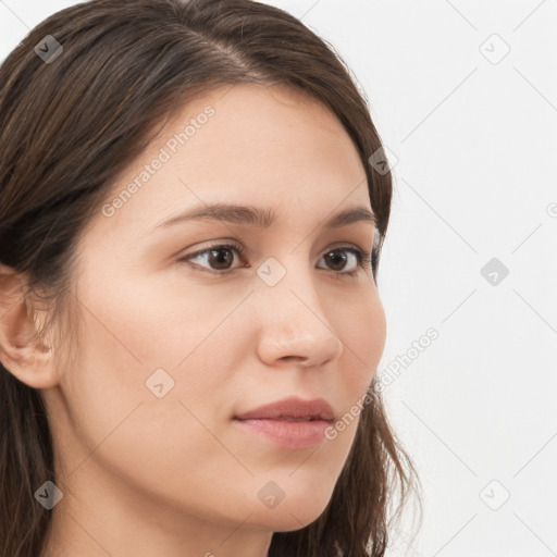 Neutral white young-adult female with long  brown hair and brown eyes