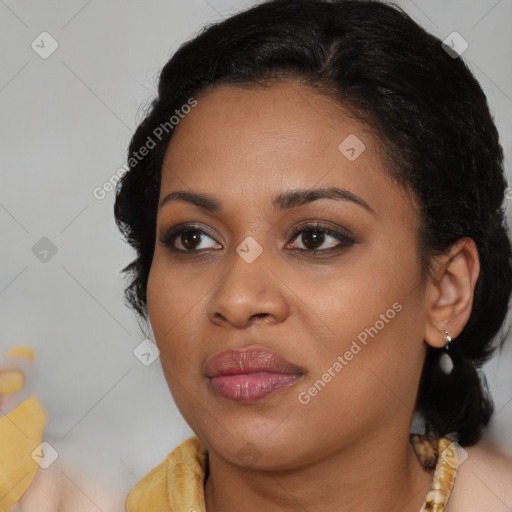 Joyful black young-adult female with medium  brown hair and brown eyes