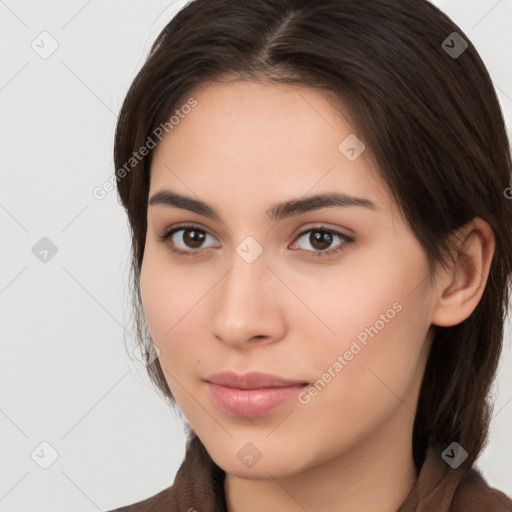 Neutral white young-adult female with long  brown hair and brown eyes