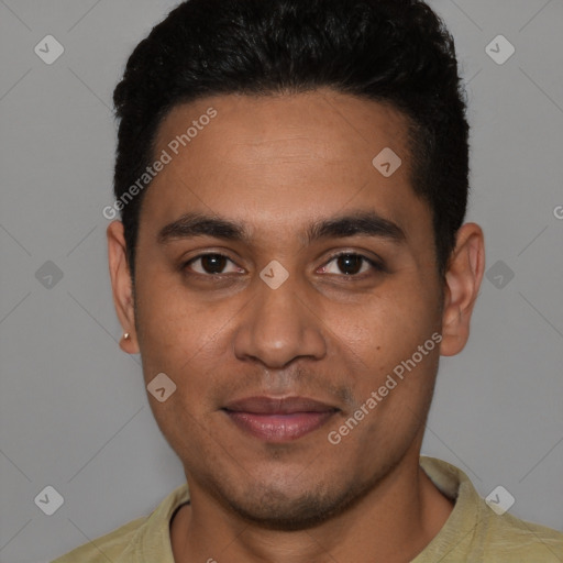 Joyful white young-adult male with short  black hair and brown eyes