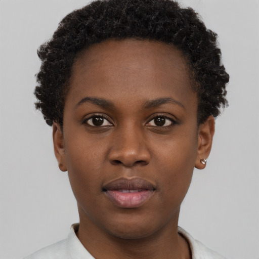 Neutral black young-adult female with short  brown hair and brown eyes