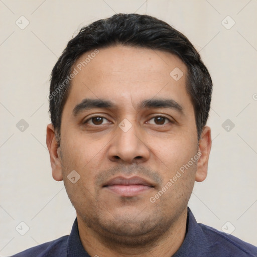 Neutral latino young-adult male with short  black hair and brown eyes