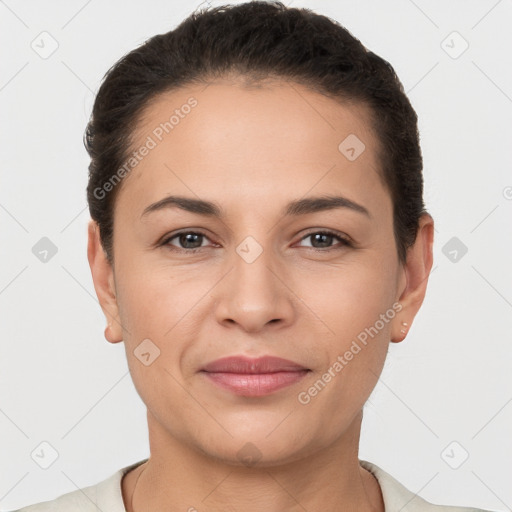 Joyful white young-adult female with short  brown hair and brown eyes