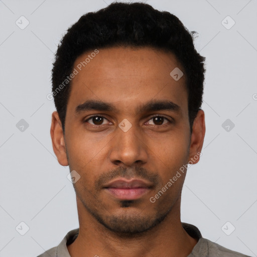 Neutral latino young-adult male with short  black hair and brown eyes