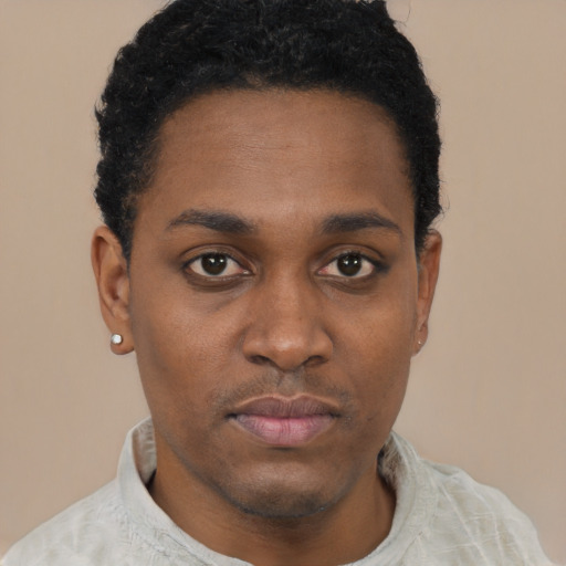 Neutral black young-adult male with short  black hair and brown eyes
