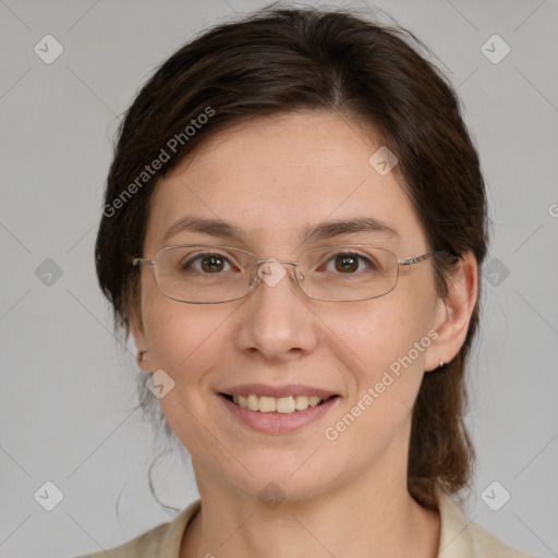 Joyful white adult female with medium  brown hair and brown eyes