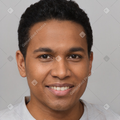 Joyful black young-adult male with short  black hair and brown eyes