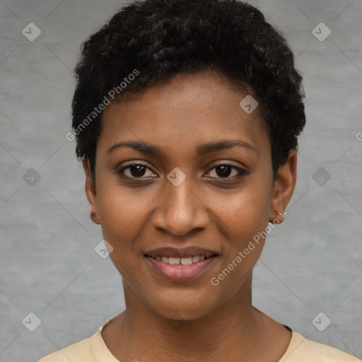 Joyful black young-adult female with short  black hair and brown eyes