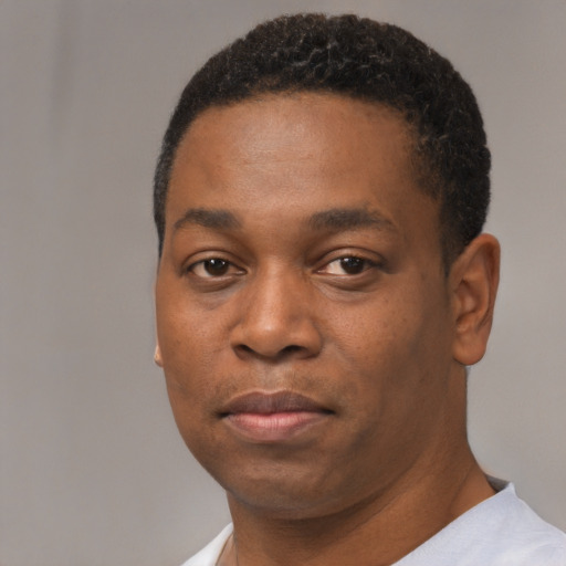 Neutral black young-adult male with short  black hair and brown eyes