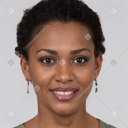 Joyful black young-adult female with short  brown hair and brown eyes