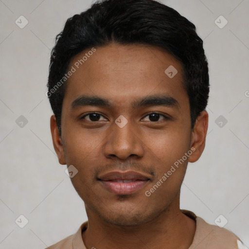 Joyful latino young-adult male with short  black hair and brown eyes