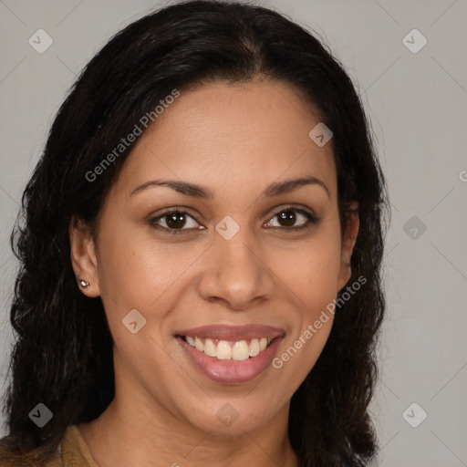 Joyful latino young-adult female with long  brown hair and brown eyes