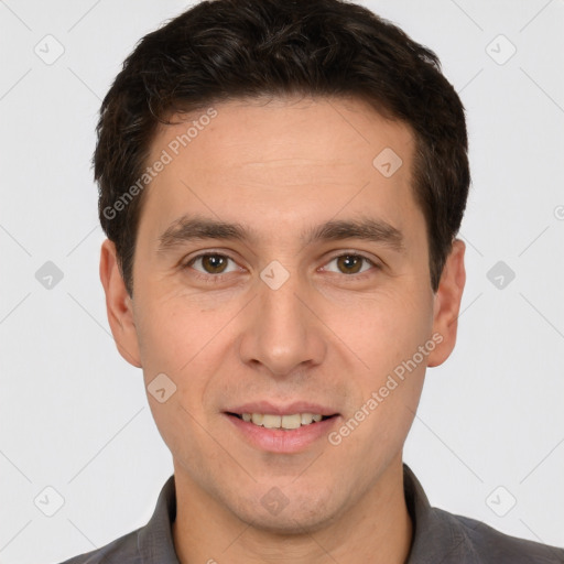 Joyful white young-adult male with short  brown hair and brown eyes