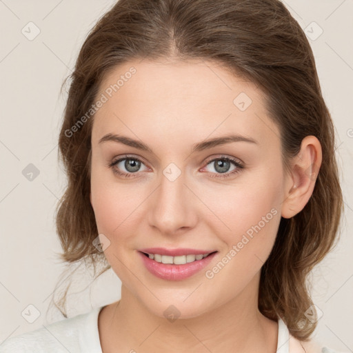 Joyful white young-adult female with medium  brown hair and green eyes