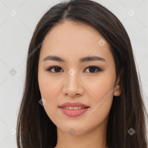 Joyful asian young-adult female with long  brown hair and brown eyes