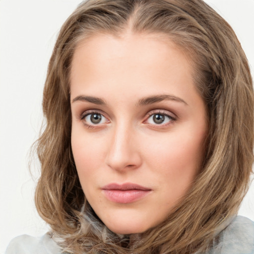 Neutral white young-adult female with long  brown hair and green eyes