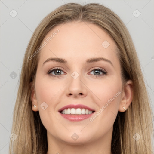 Joyful white young-adult female with long  brown hair and grey eyes