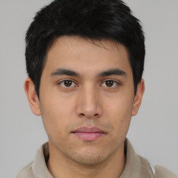 Neutral asian young-adult male with short  brown hair and brown eyes