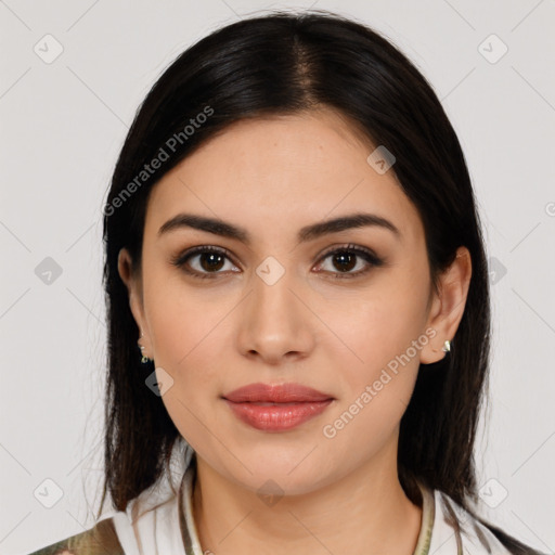 Joyful latino young-adult female with medium  brown hair and brown eyes