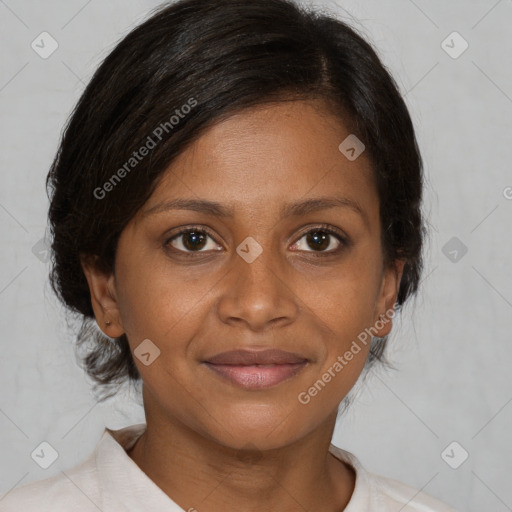 Joyful black young-adult female with medium  brown hair and brown eyes