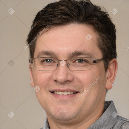 Joyful white adult male with short  brown hair and grey eyes