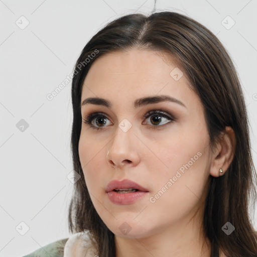 Neutral white young-adult female with medium  brown hair and brown eyes