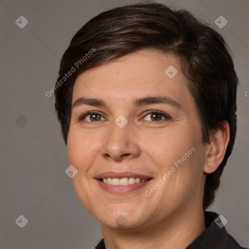 Joyful white adult female with short  brown hair and brown eyes