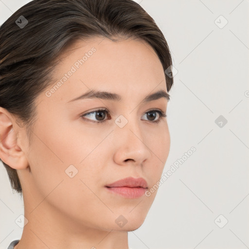 Neutral white young-adult female with medium  brown hair and brown eyes