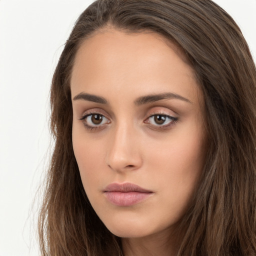 Neutral white young-adult female with long  brown hair and brown eyes