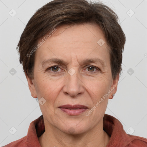 Joyful white adult female with short  brown hair and grey eyes