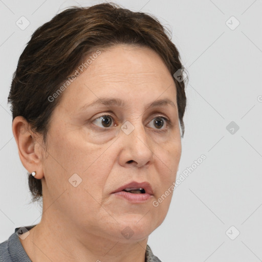 Neutral white adult female with short  brown hair and brown eyes