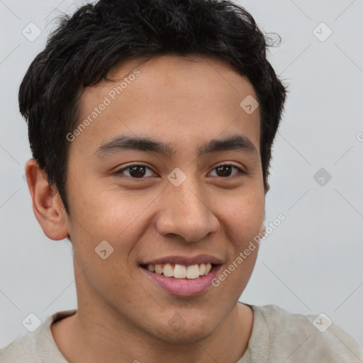 Joyful latino young-adult male with short  brown hair and brown eyes