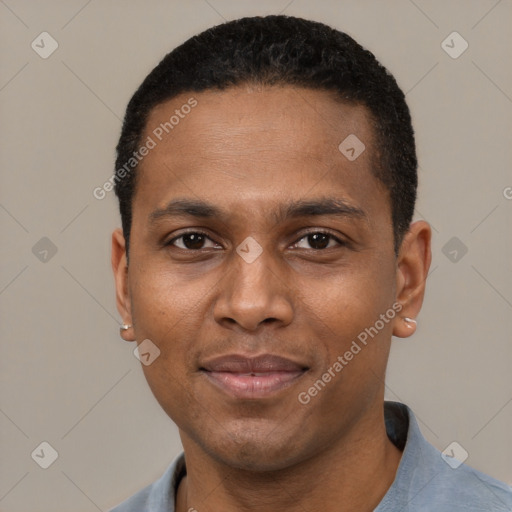 Joyful black young-adult male with short  black hair and brown eyes