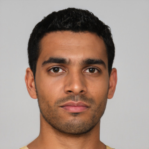 Neutral latino young-adult male with short  black hair and brown eyes