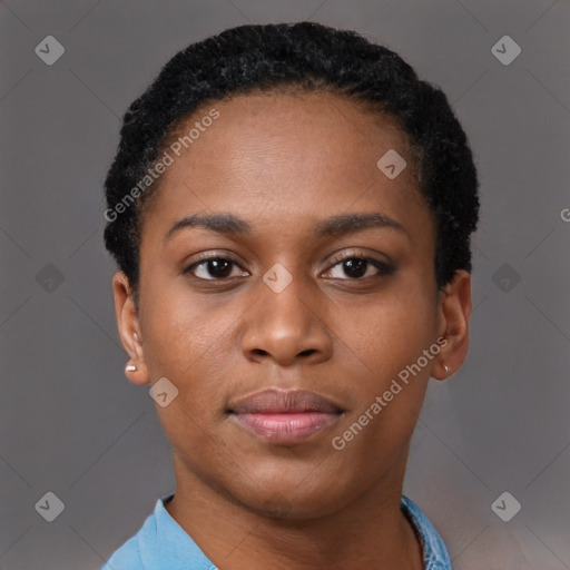 Joyful black young-adult female with short  black hair and brown eyes