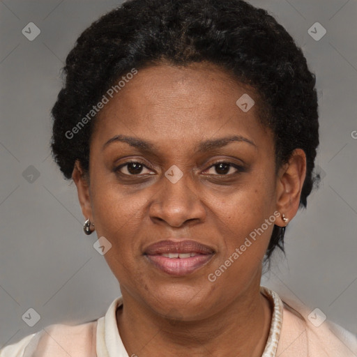 Joyful latino adult female with short  brown hair and brown eyes