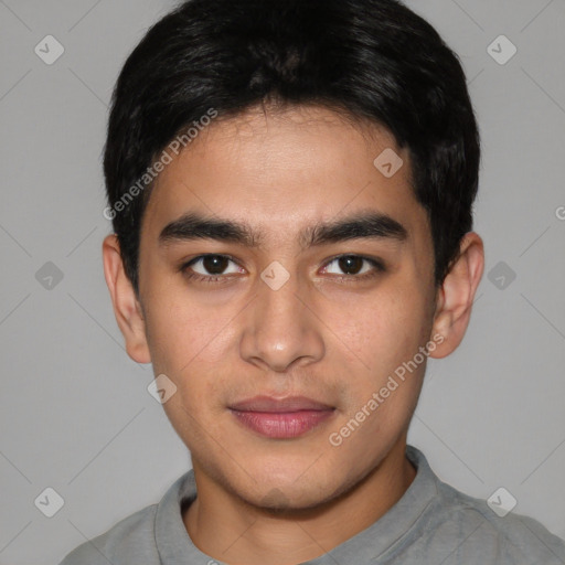 Joyful white young-adult male with short  black hair and brown eyes