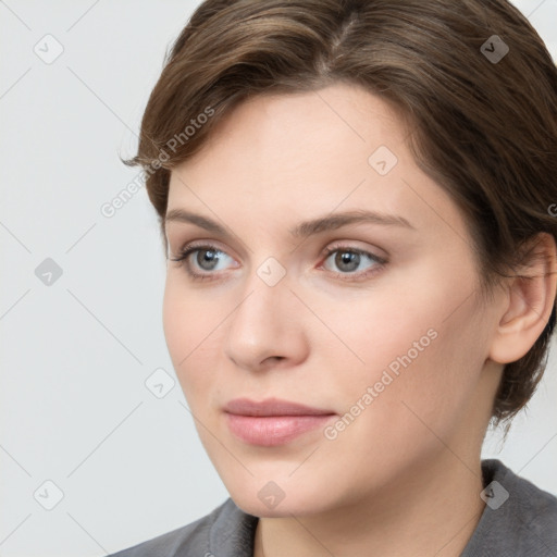 Neutral white young-adult female with medium  brown hair and grey eyes