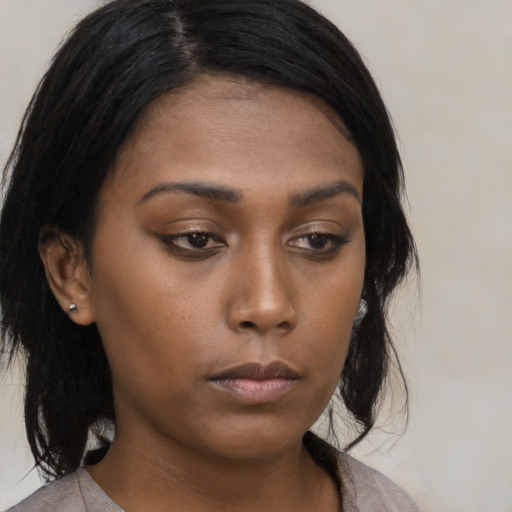 Neutral asian young-adult female with medium  brown hair and brown eyes