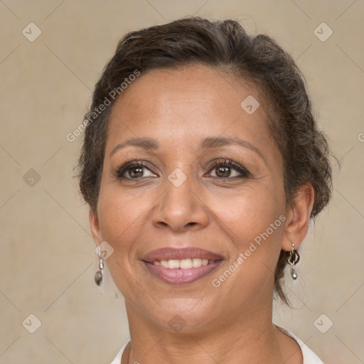 Joyful white adult female with short  brown hair and brown eyes