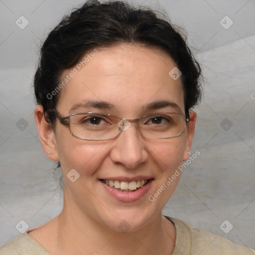 Joyful white adult female with short  brown hair and brown eyes