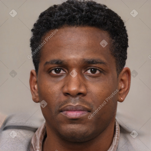 Neutral black young-adult male with short  brown hair and brown eyes