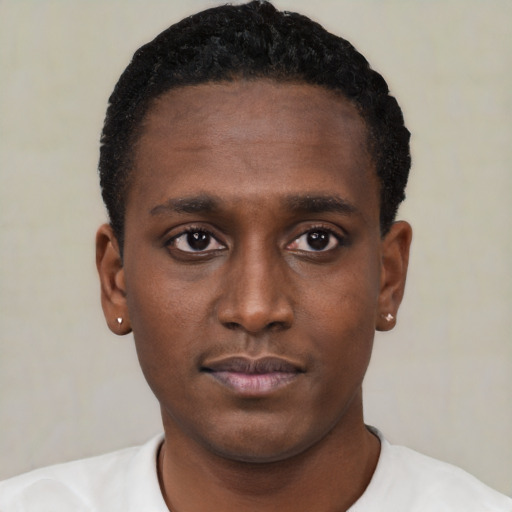 Neutral black young-adult male with short  black hair and brown eyes