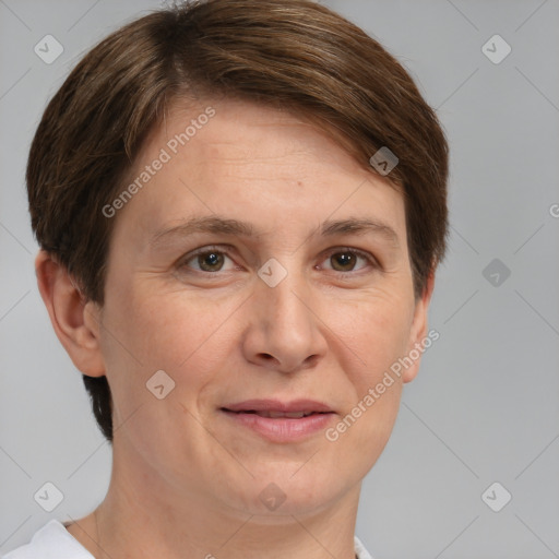 Joyful white adult female with short  brown hair and grey eyes