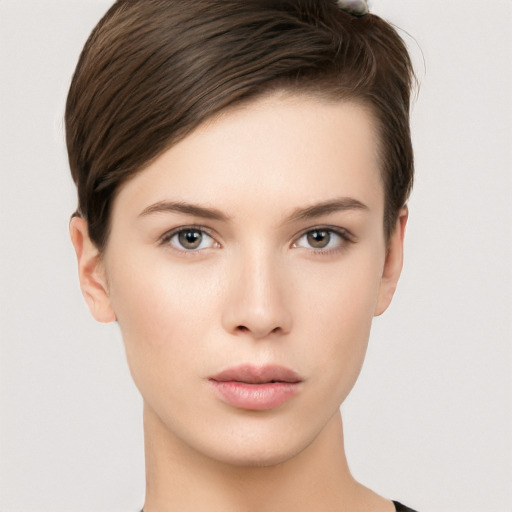 Neutral white young-adult female with short  brown hair and brown eyes