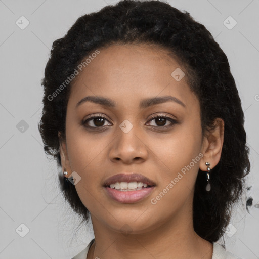 Joyful latino young-adult female with long  black hair and brown eyes