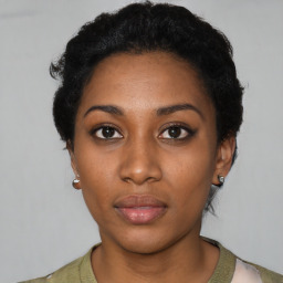 Neutral black young-adult female with short  black hair and brown eyes