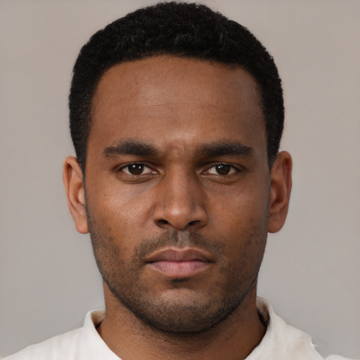 Neutral black young-adult male with short  black hair and brown eyes