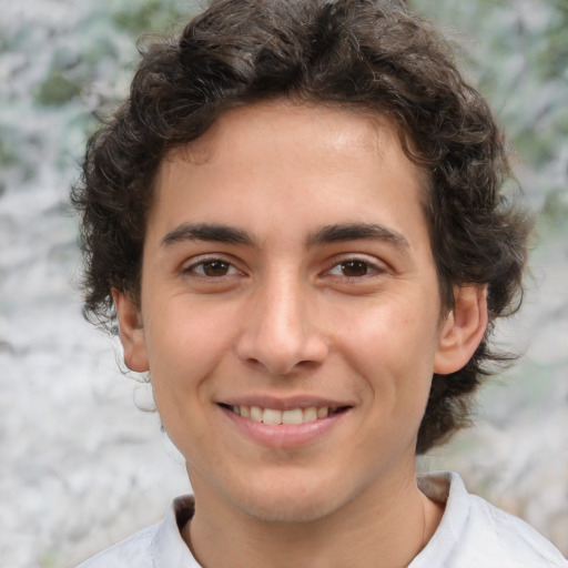 Joyful white young-adult male with medium  brown hair and brown eyes