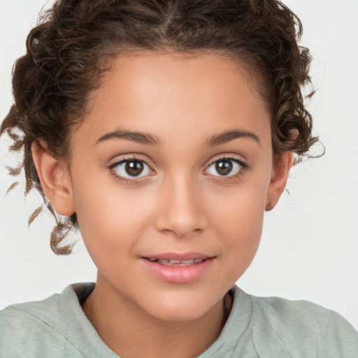 Joyful white child female with short  brown hair and brown eyes